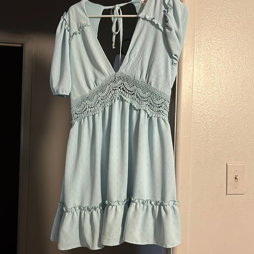 Dress from Rue 21, never worn, Size Medium but can fit a large as well.